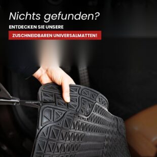Hand hält eine schwarze Universal-Gummifussmatte, die mit einer Schere auf die passende Grösse zugeschnitten wird